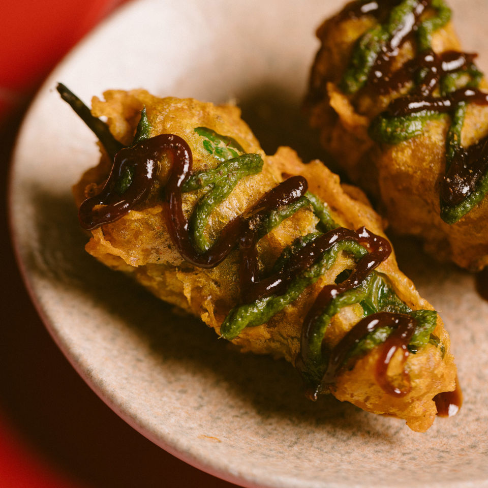 Mirchi vada, goats curd, tamarind. Image: Rebecca Hope Photography